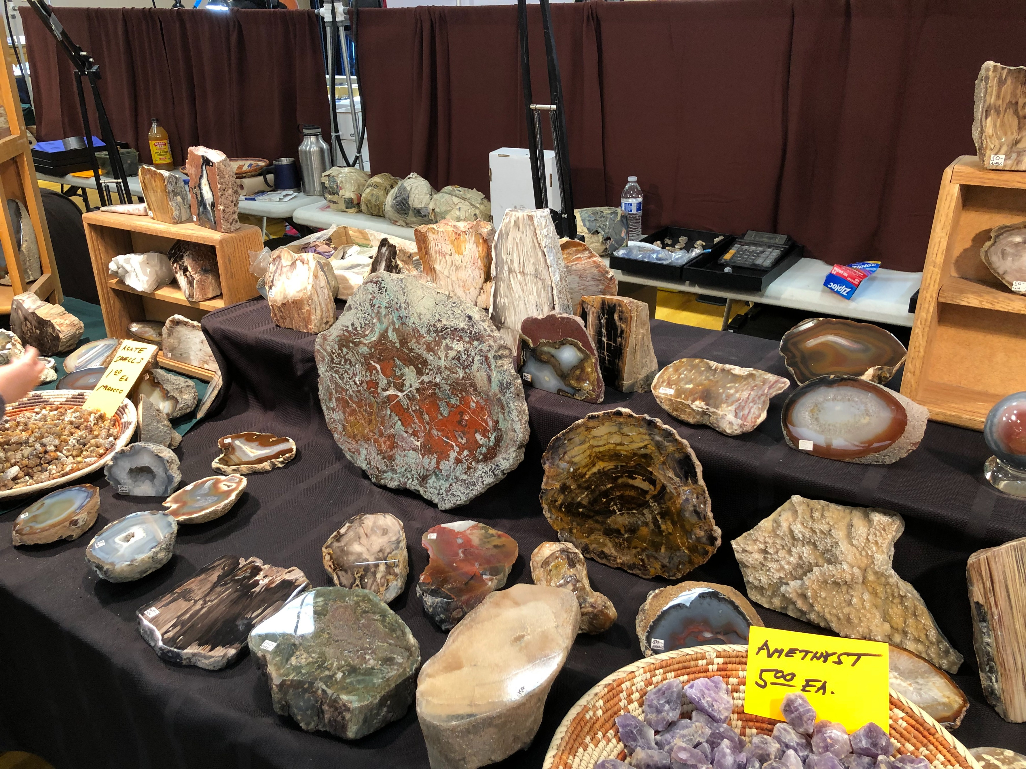 Vendor selling petrified wood and agates.