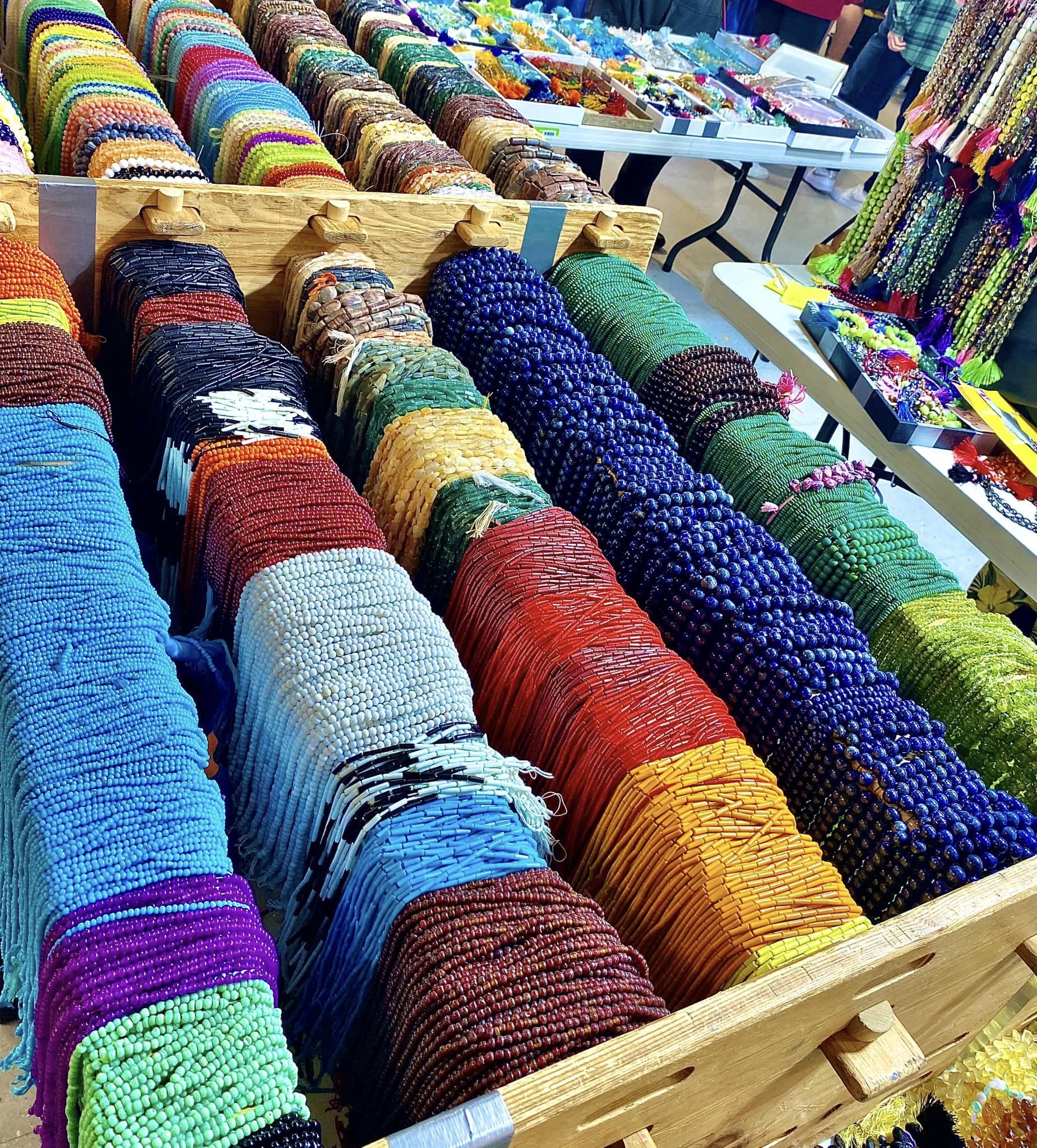 Vendor selling bead strings.